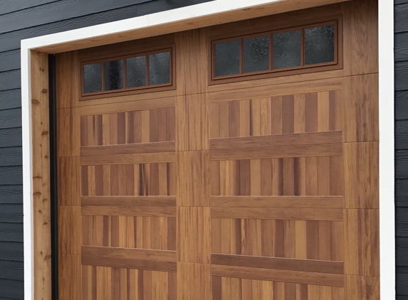 Angel Door Company - Seguin, TX. CHI model 5983 cedar metal door pictured.