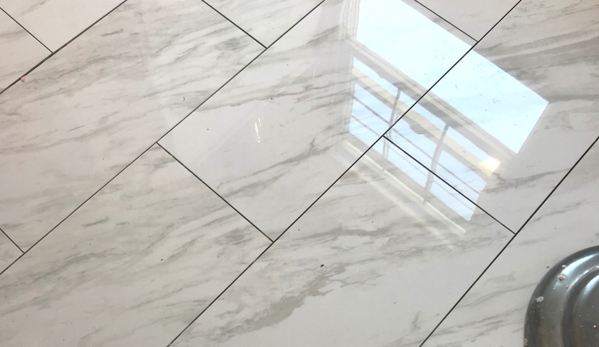 Elite Contractors - Naperville, IL. This beautiful floor is blowing my mind! Nothing is classier than white marble.