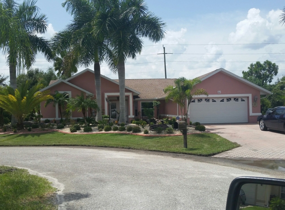 Chris Black Landscaping - Punta Gorda, FL. Redesigned  3 times scene  1992 first time 2005 last time 2015 this time live my work she so happy