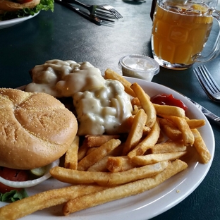 Howard's Restaurant - Gatlinburg, TN. Char Broiled Chicken with sauteed mushrooms and onions with pepper jack cheese.