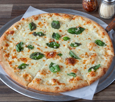 Winner's NY Pizza - Agoura Hills, CA. White Pie
White garlic sauce with fresh basil, garlic and the best cheese on the market.