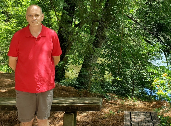 Carl Sandburg Home National Historical Site - Flat Rock, NC. Bill Lewis of Vero Beach, Florida, spending a quiet afternoon walking the trails of the Carl Sandburg Home in Flat Rock, North Carolina.