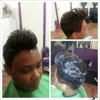 Faith McDaniel inside Flava Hair Salon -Duncanville gallery