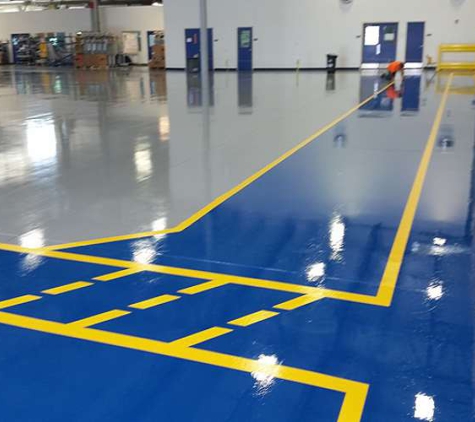 Elite Industrial Floors - Siler City, NC. EIF 101 PRIMER 7 MILS  EIF 103 EPOXY UV CR 30 MILS URETHANE TOP COAT 5 MILS UV CR 4 INCH  TRAFFIC LINES  YELLOW  UV CR