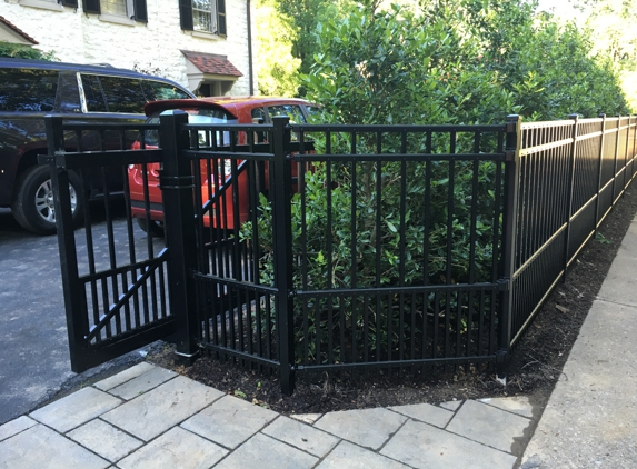 Pro Max Fence Systems - Reading, PA. Custom designed fence to accentuate the curb appeal. Functionality at work with a cantilever sliding gate allowing access from alleyway. 