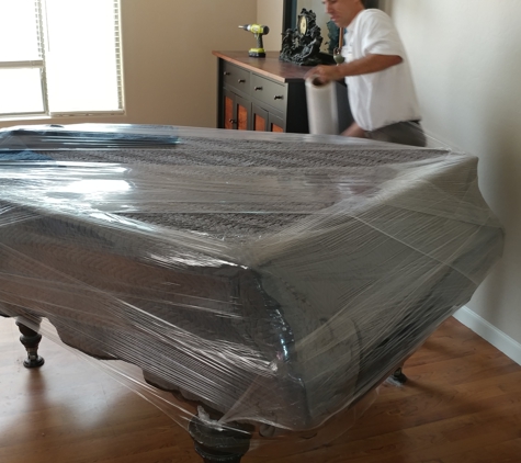 Phoenix Piano Moving - Phoenix, AZ. before piano mover, pad and wrap piano