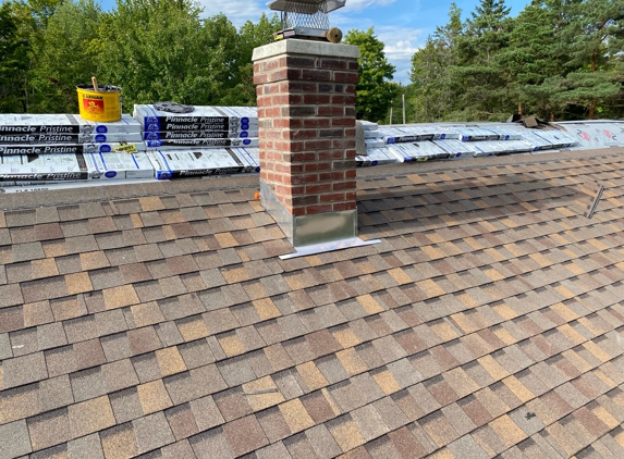 Bill's Roofing - Rome, NY. New roof with chimney re-flashed