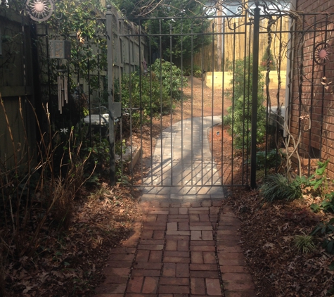 Morales Landscaping Pinestraw Services - Landscaping, Design, & Tree Service, SC. New paver walkway joined into existing brick (timber retaining wall in background)