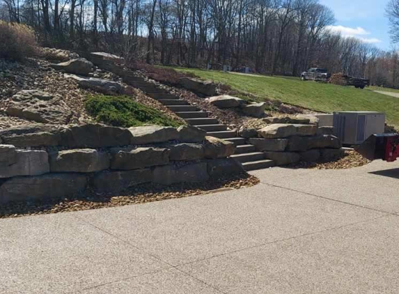 New  Hope Tree Landscape - Slippery Rock, PA. Completed stone retaining wall and stairs.