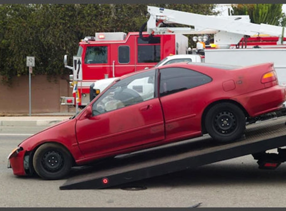 Burgess Paint 'N' Panel. 24 hrs Towing Available