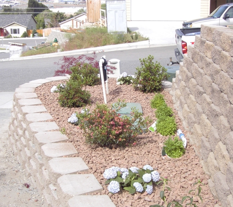 Osorio's Quality Landscaping. Retaining walls with planters