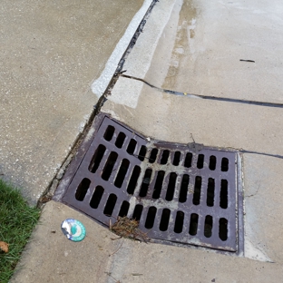 Curb Masters Concrete Cutting - Hartville, OH. Big bump on our driveway approach that caused major repairs to our car.  Thanks Curb Masters for fixing the problem!  A very inexpensive fix