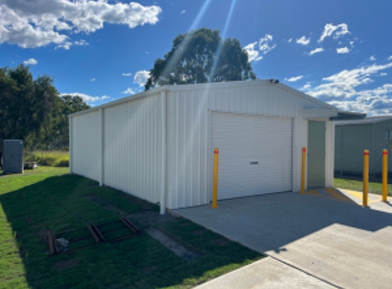 McHUGH STEEL FRAMING. Domestic Storage Shed Built in Oakwood - Surfmist