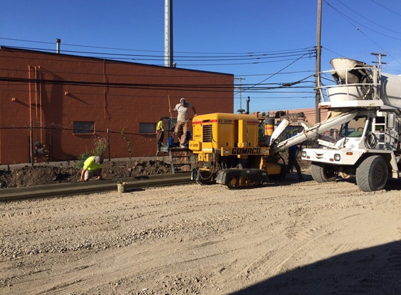 Michigan Home Improvements.com - Taylor, MI. Installing Curbs at Holiday Inn Express