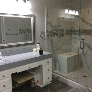 Granite Transformations of Little Rock - North Little Rock, AR. Grey Quarts Counter Top and Quartz Marble Shower with Stone and Glass Mosaic Tile Inlay