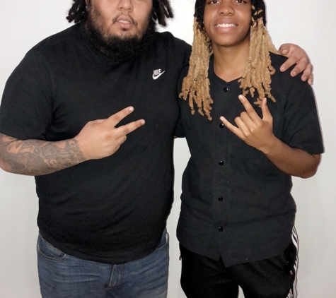 Dread House - Edinburg, TX. Tito and Creator of Dread House after 12 hours of creating his dreadlocks.