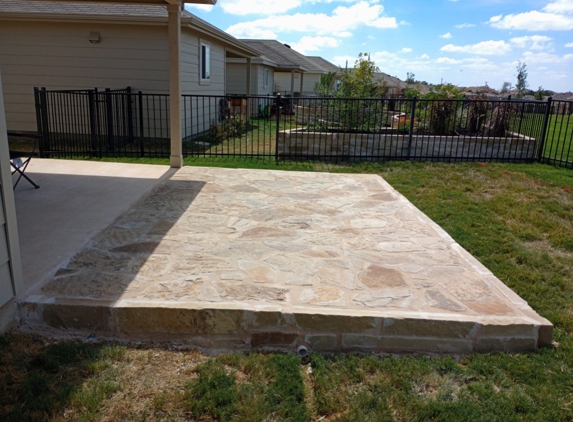 mccain enterprise landscaping services - San Antonio, TX. 10 x 16 flagstone patio extension using Oklahoma brown mix and tan grout. 
