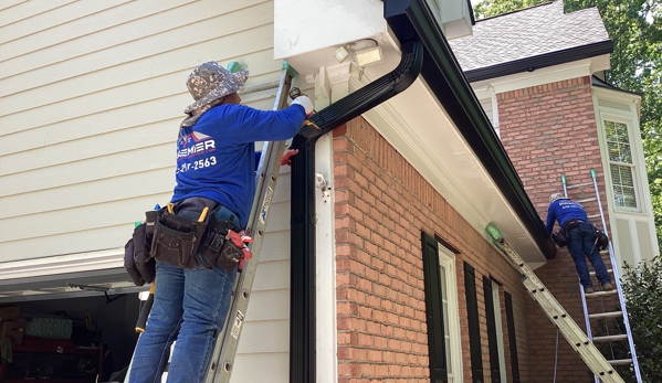 Premier Roofing And Construction - Snellville, GA. Black 6” Gutters, Gutter Guards and Downspouts Installation