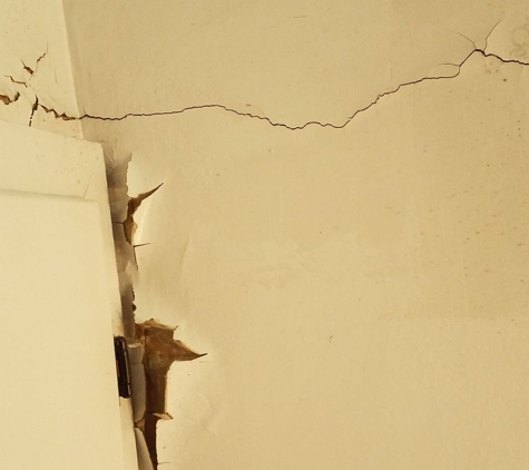 Bell Air Conditioning - Irving, TX. High humidity levels has created bathroom ceiling to peel.