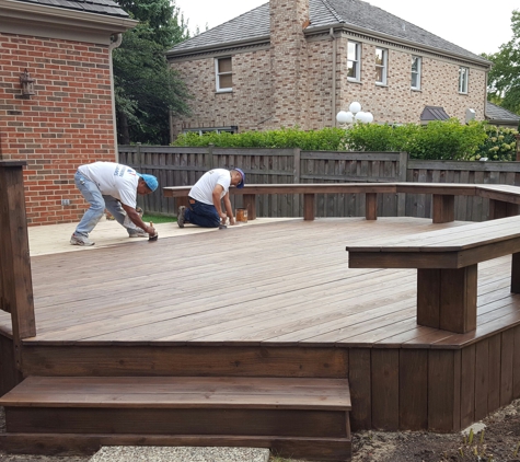 CHJ Painting & Remodeling, Inc. - Niles, IL. Glenview deck during staining by CHJ Painting