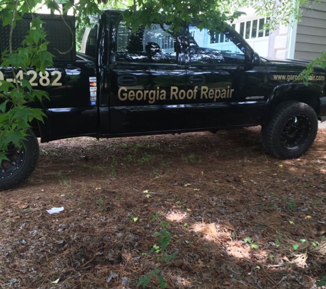 Georgia Roof Repair - Acworth, GA. Georgia Roofs Trucks are Lettered and both have attached Ladder Racks. We are easily spotted anywhere