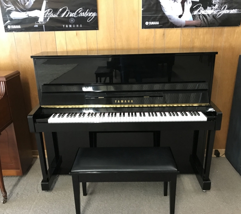 Paul Hewitt Music Co - Monroe, LA. YAMAHA STUDIO 
POLISHED EBONY