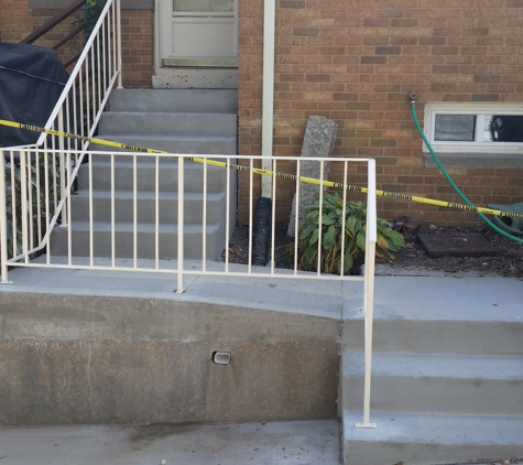 Classic Concrete Raising Inc. - Cedar Rapids, IA. After renovation railing concrete project