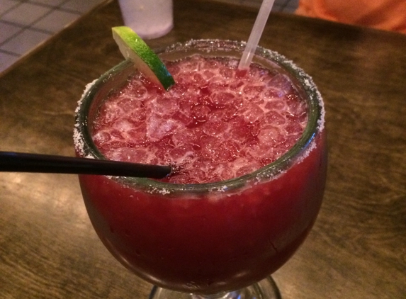 Black Sheep Burrito & Brews - Huntington, WV. Took two of us to work on this luscious blackberry margarita and still barely got it down! Sooooo good!!!! ������������