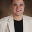 Adrian Buca, DDS - Dentists