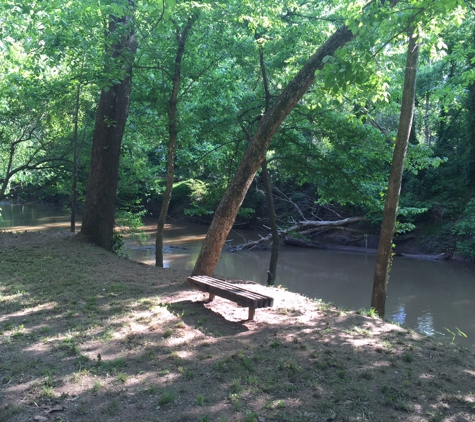 Jim's Maintenance - Raleigh, NC. Fence to creek bank cleanup