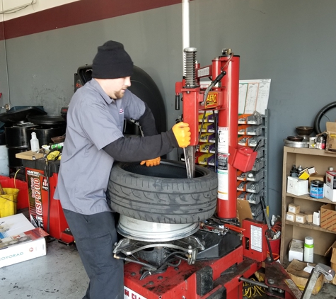 Los Gatos Auto Service - Campbell, CA. Chris Schuster, Our technician replacing tires on a BMW.
He is a all around technician with lots of diagnostic training.