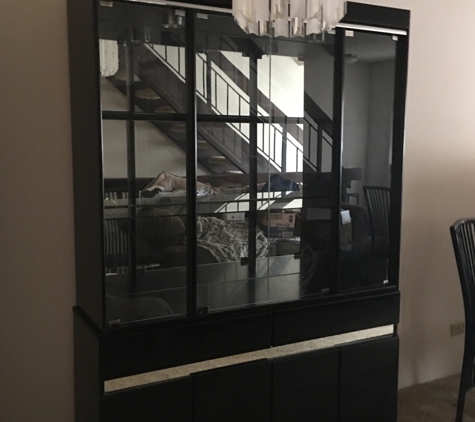 Re-for Your Home - Denver, CO. Contemporary laquer and black with glass. Lovely place to put your favorite collections.