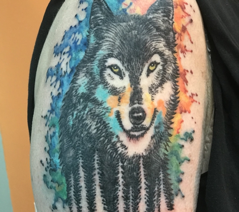 Ocean Blue Tattoo & Art Studio - Minneapolis, MN. Water Color Wolf Tattoo