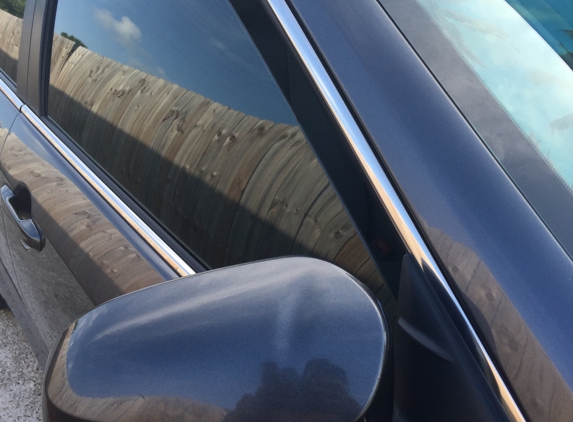 Auto Glass Now - Metairie, LA. Dented Rearview Mirror