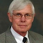 Dr. Charles E. Huggins, MD