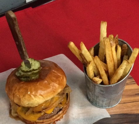 Center Fields Sports Bar and Grill - Milwaukee, WI. The Double Play - 6 oz. all natural beef patty, 4 oz. house made brat patty with Wisconsin cheddar cheese & a side of frites (French fries).