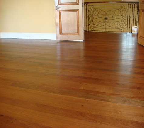 True Quality Wood Flooring - Fort Lauderdale, FL. Solid wide oak planks were sanded and coated with a natural sealer