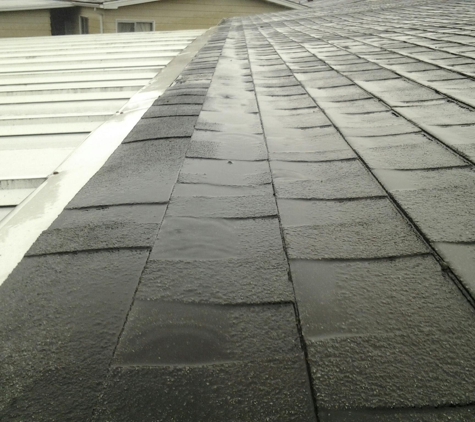 All Sound Roofing Inc. - Arlington, WA. This is what happens when you install a laminate shingle on a mobile home with a low slope.