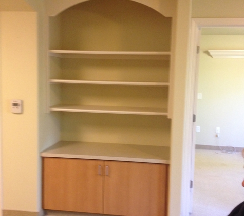 Atria Carmichael Oaks - Carmichael, CA. Built-in shelving in an assisted-living apartment.