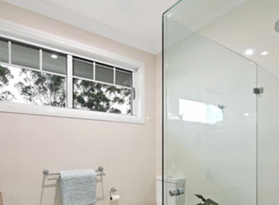 Bradnam's Windows & Doors - Emerald, QLD. Frameless Shower Screen - Corner Configuration