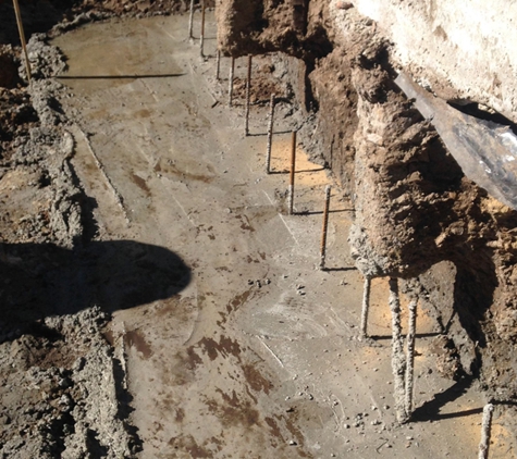 Precision Building. Repairing Water Damaged Retaining Wall Due To Inadequate Drainage