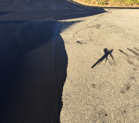 United Asphalt - Perris, CA. Before after seal coat. After(left) before (right)