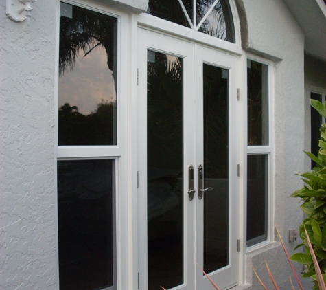 Impact Ready Glass - Bonita Springs, FL. French doors with single hung sidelight picture windows