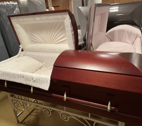 Simple Funerals - Ecorse, MI. Wood Casket
