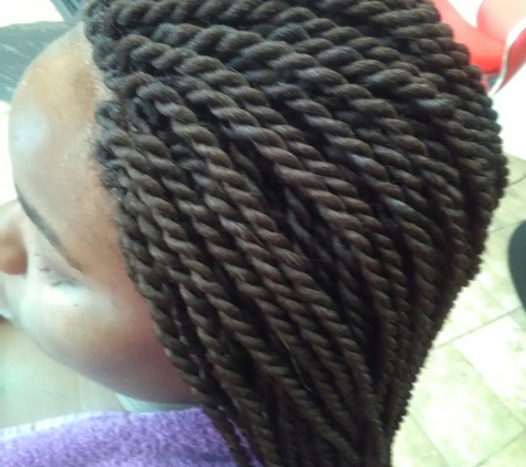 Sanopri African Hair Braiding & Fashion - Jacksonville, FL. Roll and twist