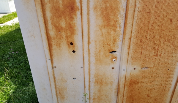 Sun Communities, Inc. - Southfield, MI. Holes in shed by some unknown..