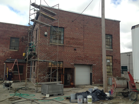 Knauss Property Services - Indianapolis, IN. Restored Building-  1. Bad lintels removed and new installed 2. Tuckpointed all  3. Following year Waterproof coated wall.  Central Indiana