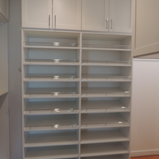 Bella Systems Philly. Shoe units with rails.  White custom closet system.