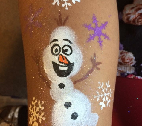 Face Painting & Caricatures - Chicago, IL. Olaf The Snowman decoratively painted on a child's arm