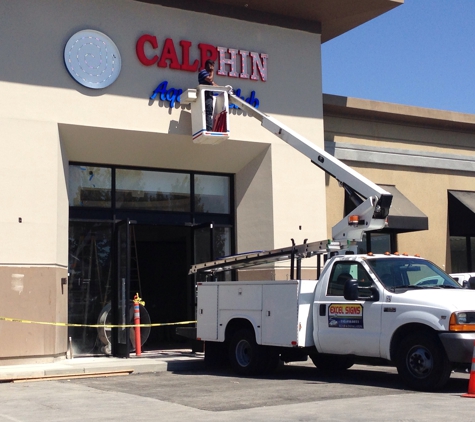 Excel Signs - Oakland, CA. We also have our boom truck service , repair signs and  install signs , change bulb on parking lot lights and etc